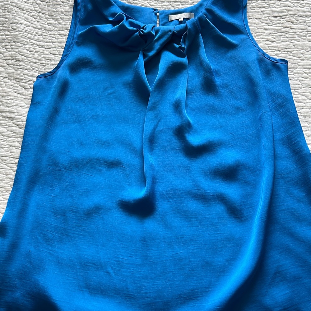 Violet and Claire size large, beautiful blue color blouse with fun, puffy detail